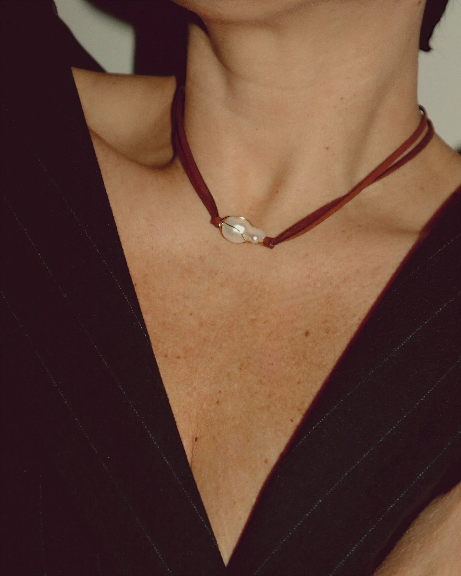 KNOTTED BAROQUE PEARL LEATHER NECKLACE